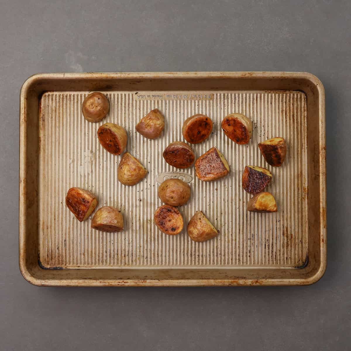 roasted potatoes on a baking sheet.
