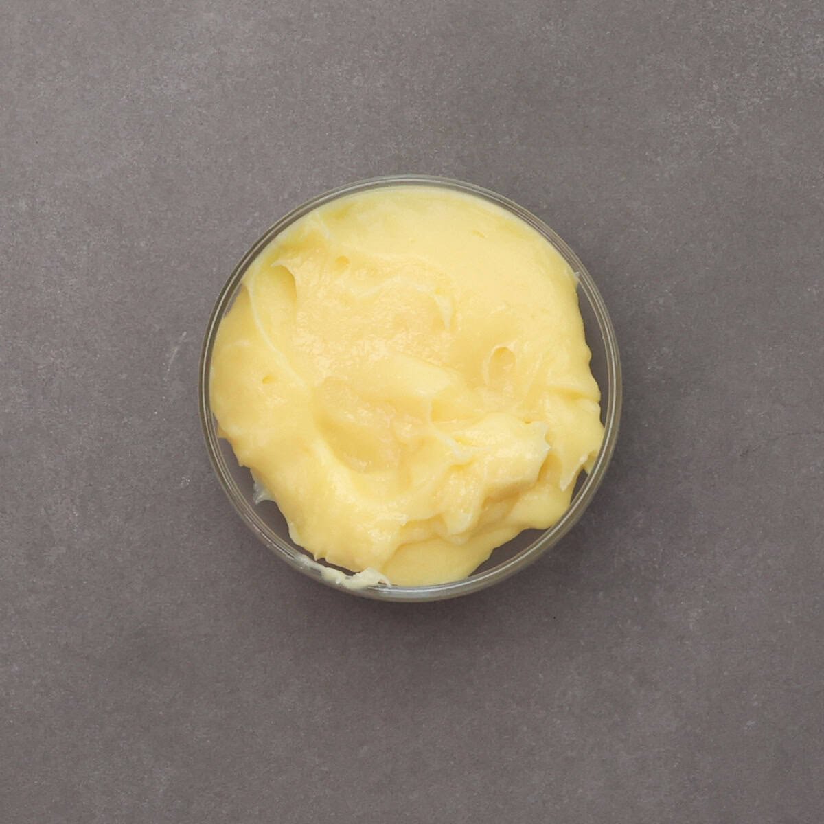 a small amount of vanilla custard in a bowl.