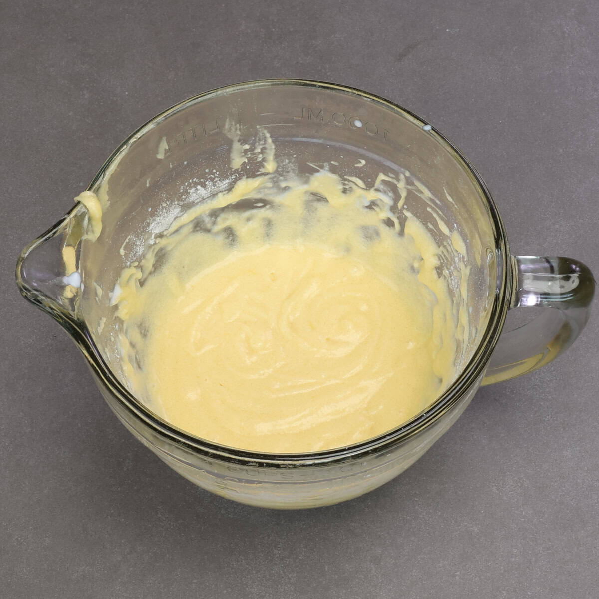 yellow cake batter in a mixing bowl.