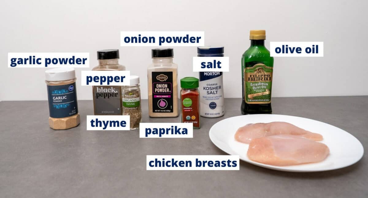 ingredients to make air fryer chicken breast on a kitchen counter.