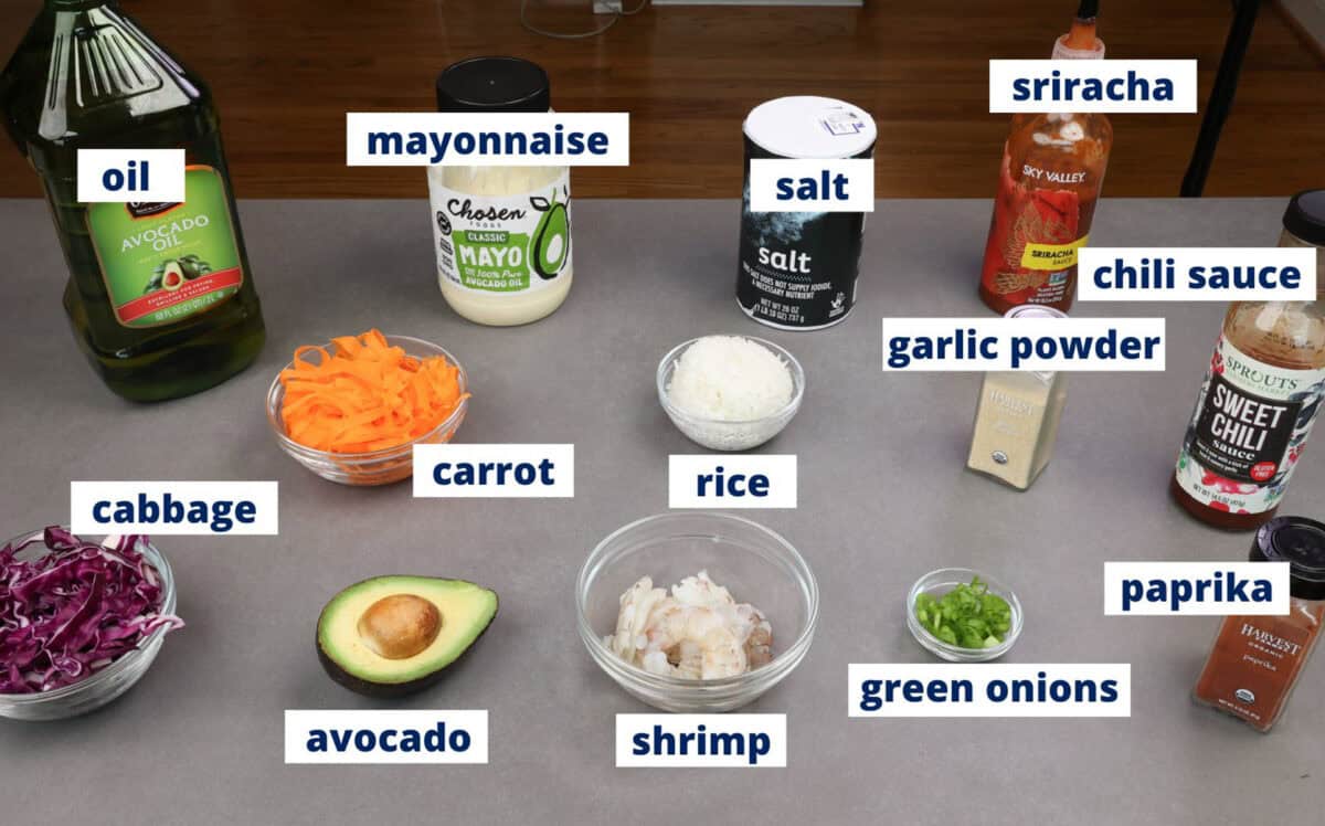 bang bang shrimp rice bowl ingredients on a kitchen counter.