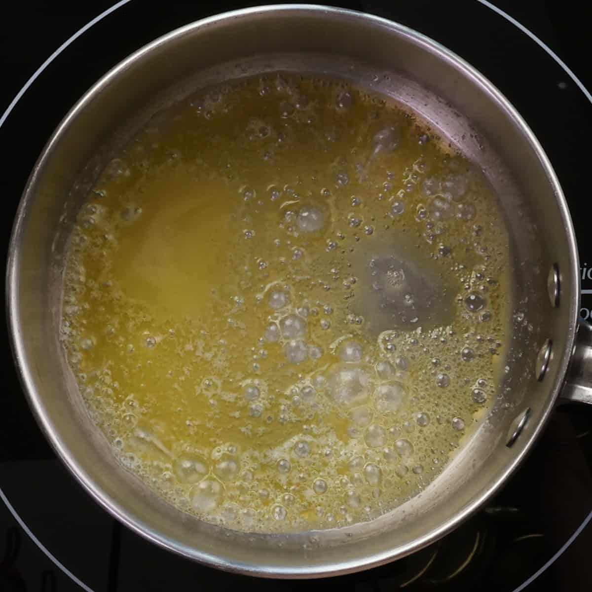 butter melting in a small saucepan.