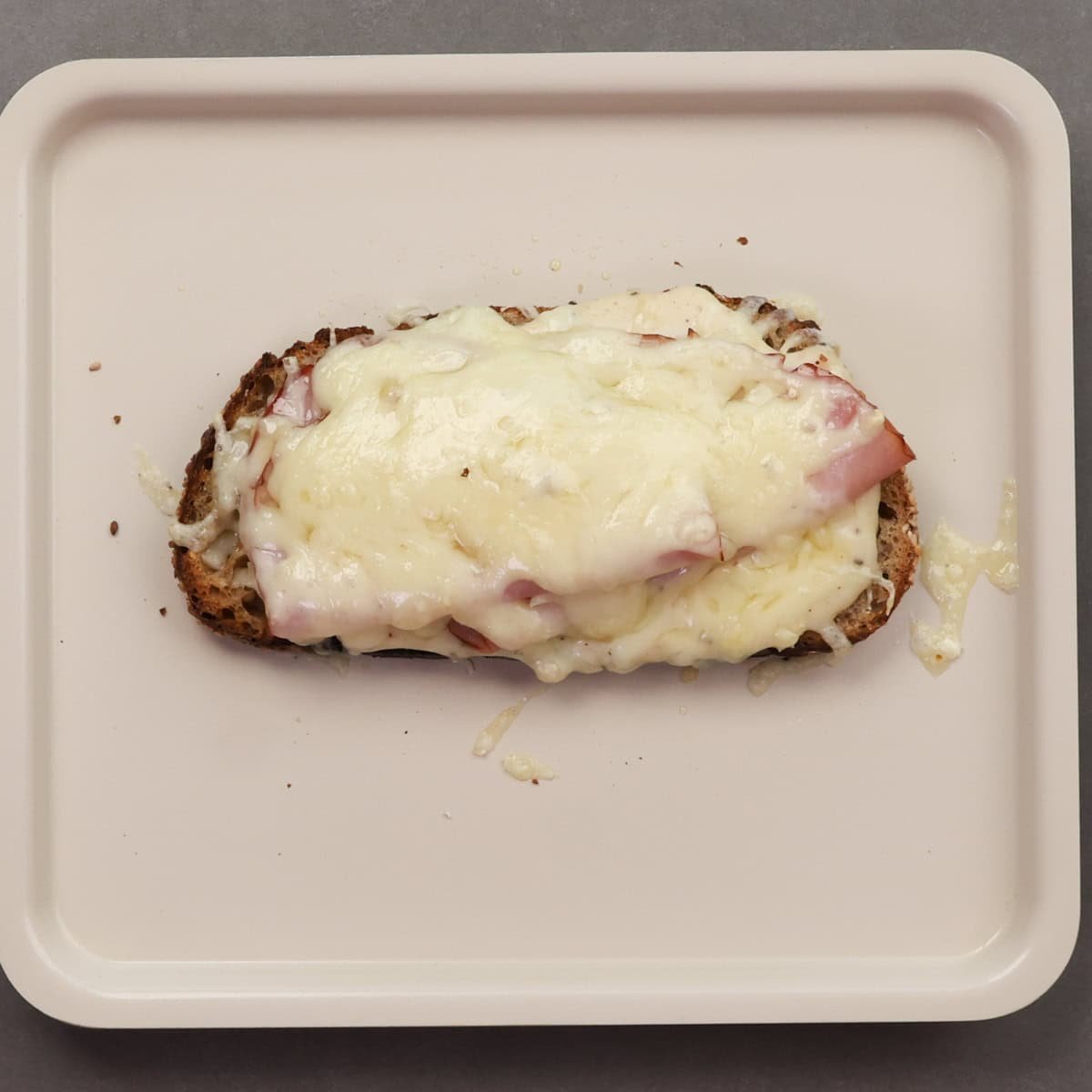 an open faced croque Monsieur.