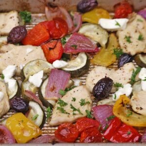 sheet pan greek chicken ingredients on pan.