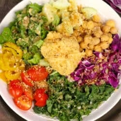 a hummus crunch salad topped with breadcrumbs and a light vinaigrette.