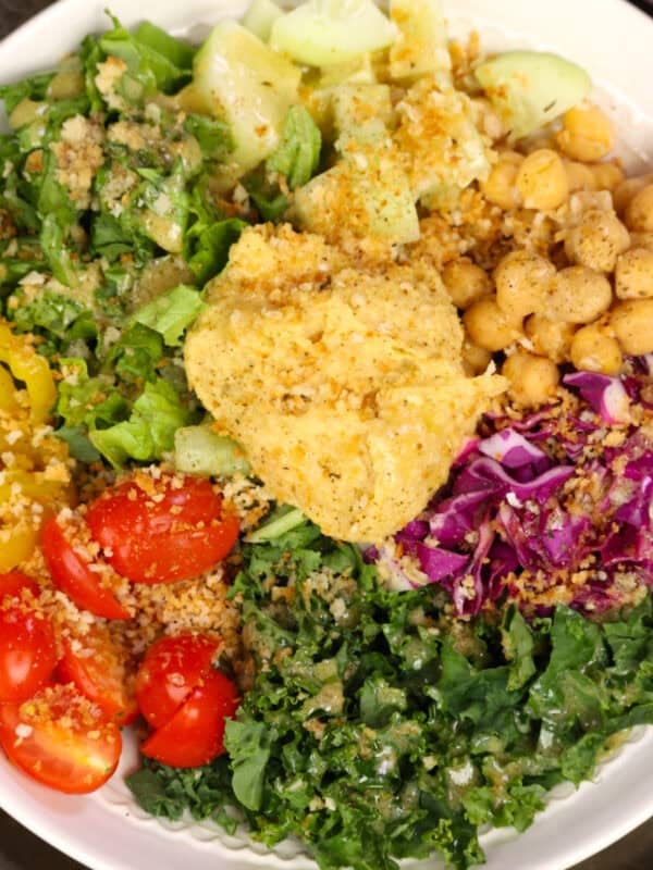 a hummus crunch salad topped with breadcrumbs and a light vinaigrette.