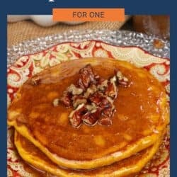 a small batch of pumpkin pancakes on a plate.