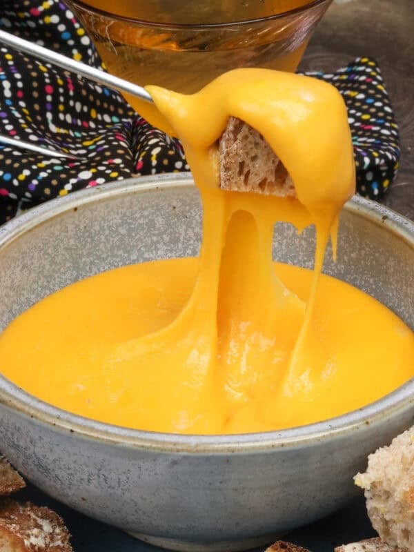 a small batch of cheese fondue with bread.