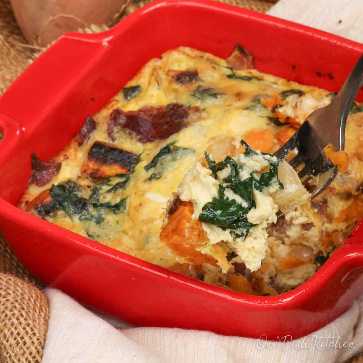 an individual crustless sweet potato quiche in a small baking dish.