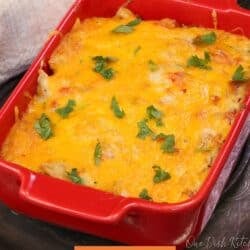 a small batch king ranch chicken casserole in a red baking dish.