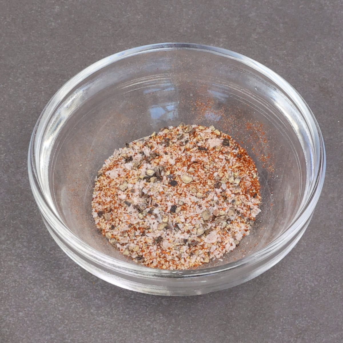 seasoning for salmon bites in a small bowl.