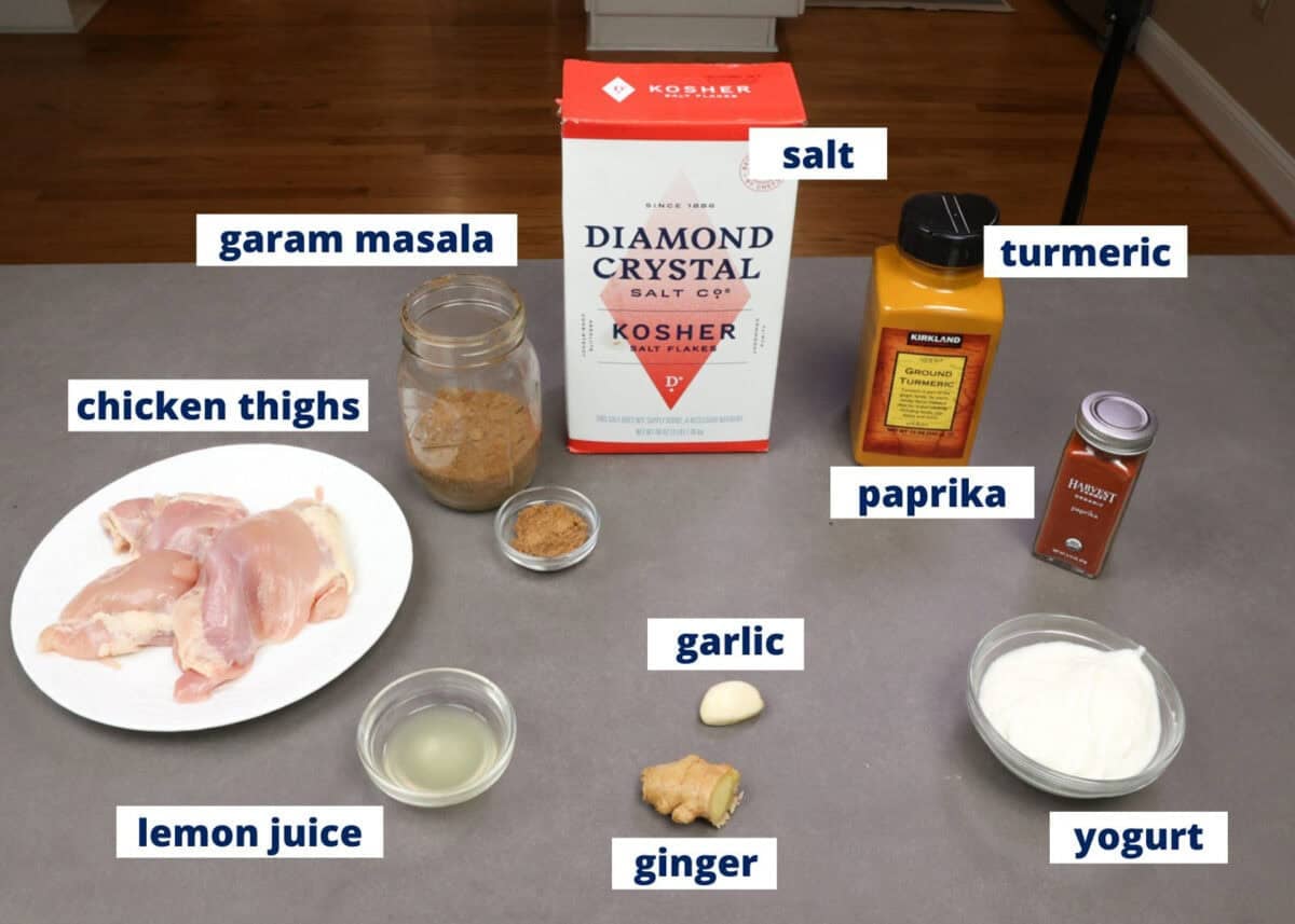 tandoori chicken ingredients assembled on a kitchen counter.