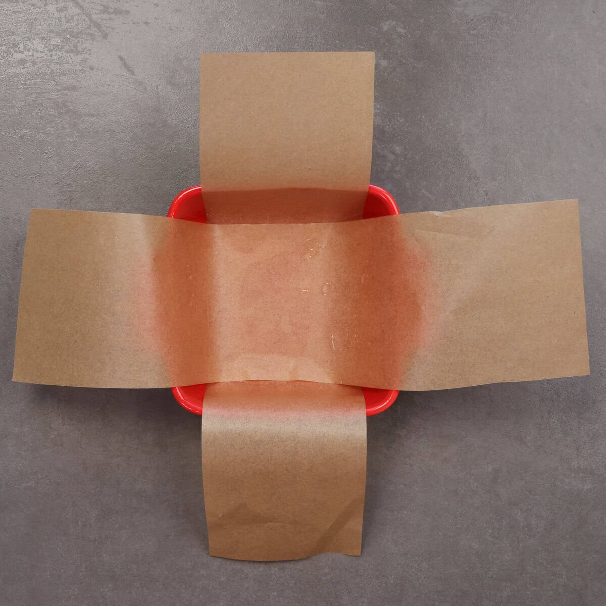 a small baking dish lined with parchment paper.